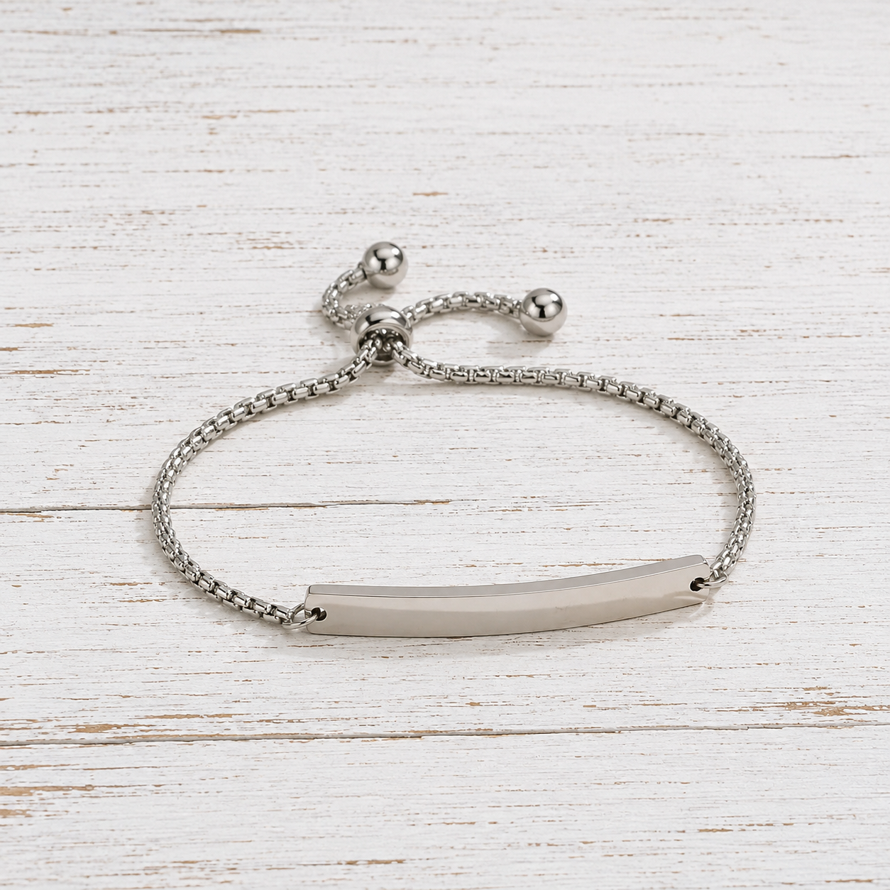 Slider adjustable bracelet with curved bar